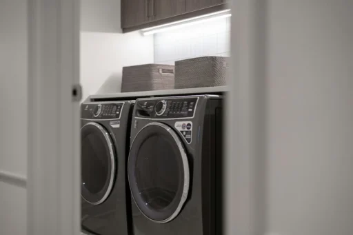 Matching washer and dryer in a bright home laundry room