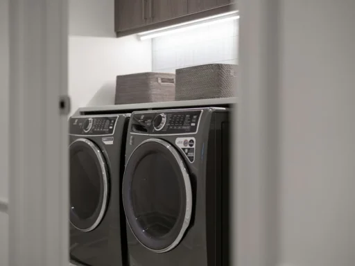 Matching washer and dryer in a bright home laundry room