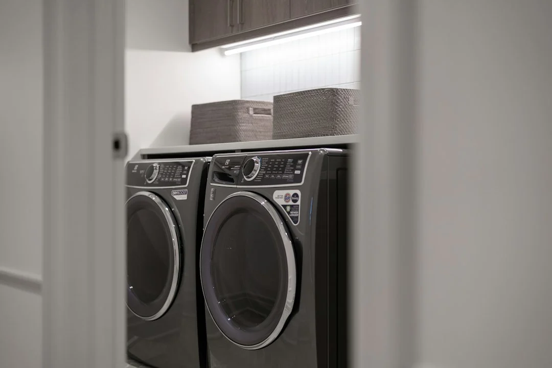 Matching washer and dryer in a bright home laundry room